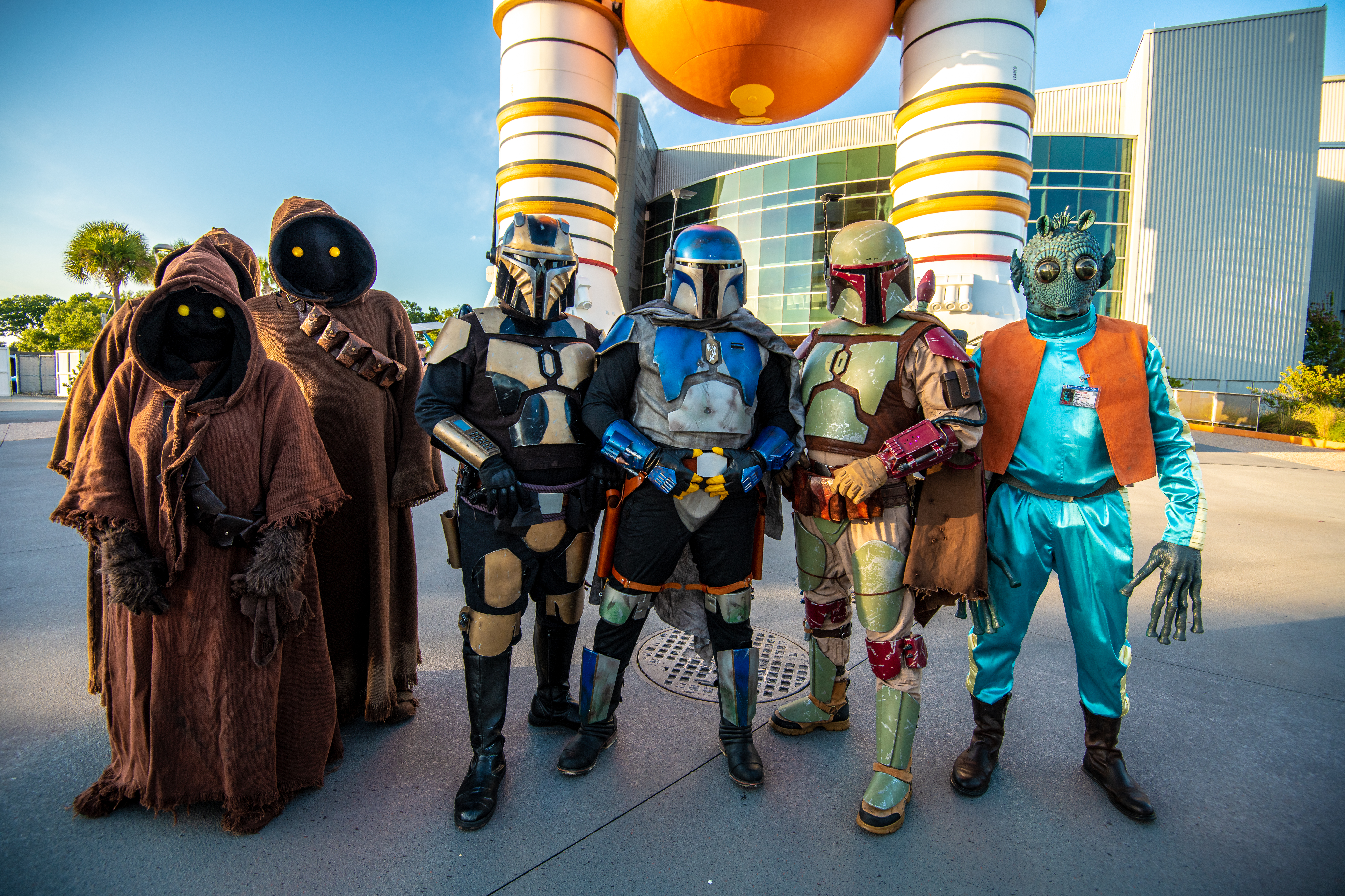 Various characters from Star Wars stand in front of the External Tank at the Kennedy Space Center Visitor Complex